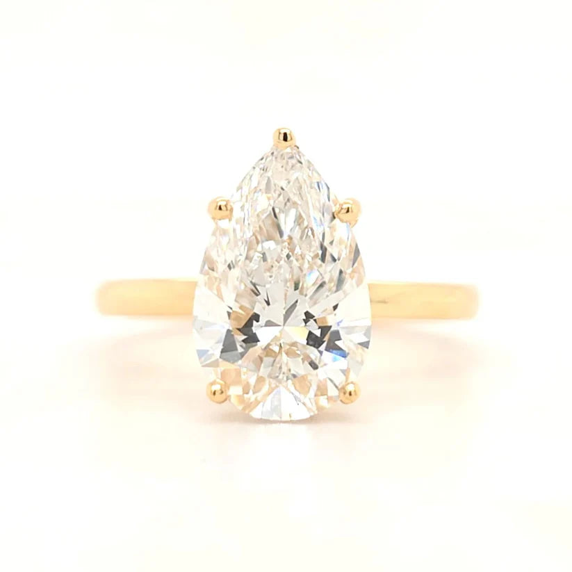 Pear Cut Solitaire Engagement Ring with Hidden Halo & Plain Band