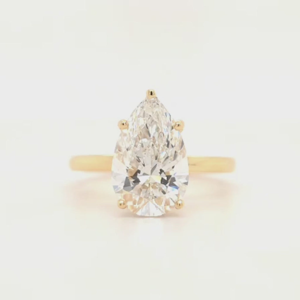 Pear Cut Solitaire Engagement Ring with Hidden Halo & Plain Band