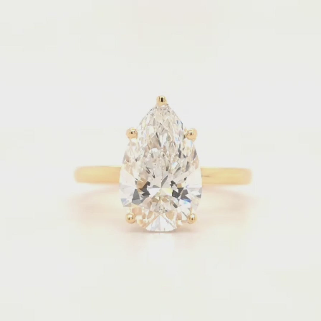 Pear Cut Solitaire Engagement Ring with Hidden Halo & Plain Band